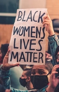 protest sign: Black women's lives